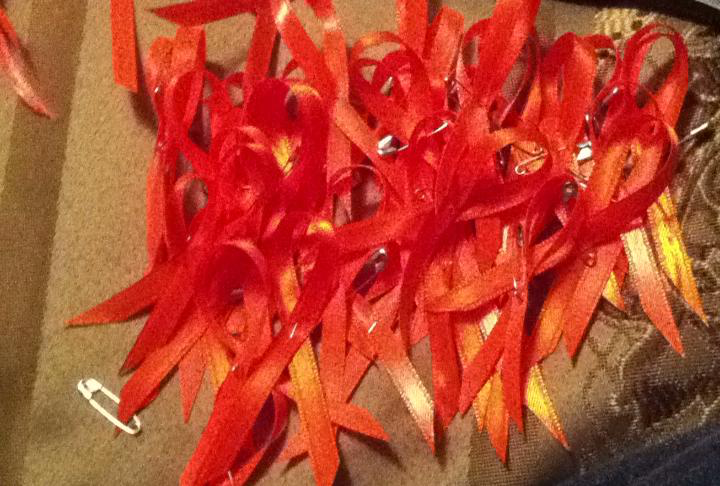 Orange ribbons handed out in Canada for Color The World Orange™ 2014
